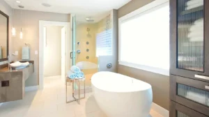 Bathroom layout with freestanding bath, vanity storage and walk-in shower area