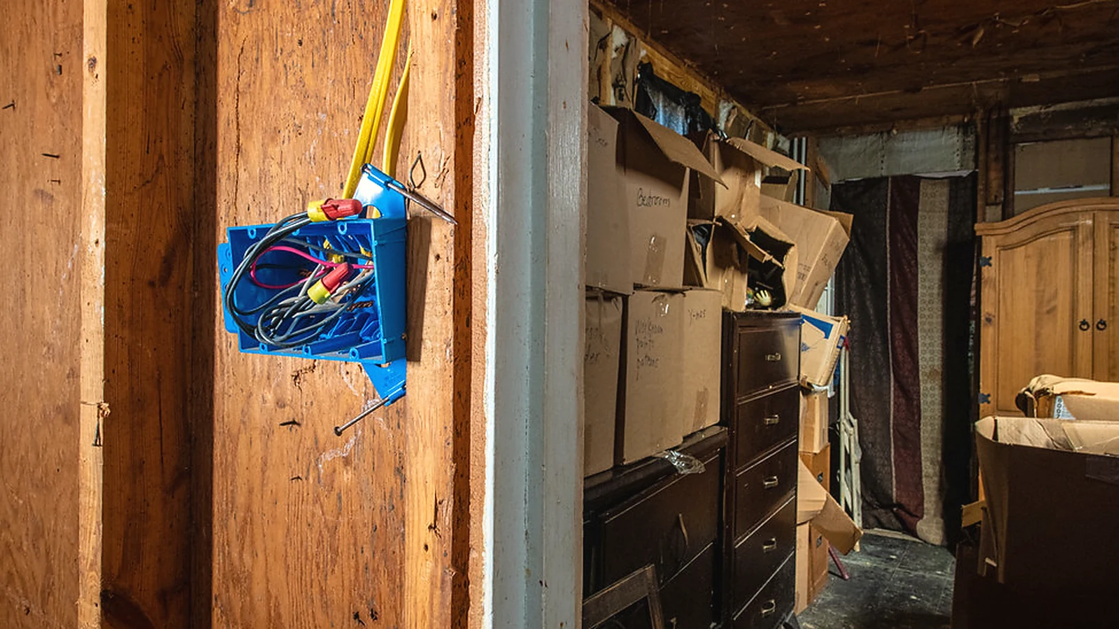 Bathroom renovation preparation with exposed wall, services and old fittings before work starts