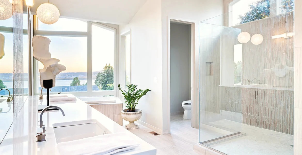 Bright family bathroom renovation with bath, shower area and practical vanity storage